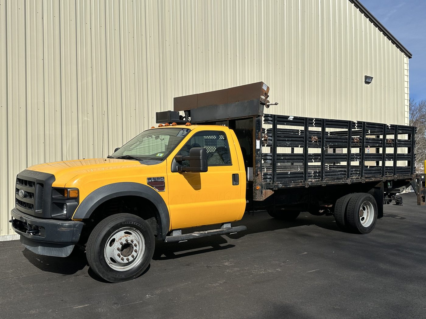 2008 Ford F-550 stake bed truck with liftgate